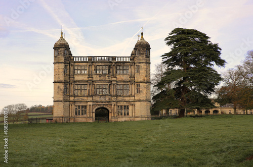 Looking across the fields towards the gatehouse at Tixall in Staffordshire. Sir Walter Aston built it in 1508 and it is considered a fine example of Elizabethan architecture