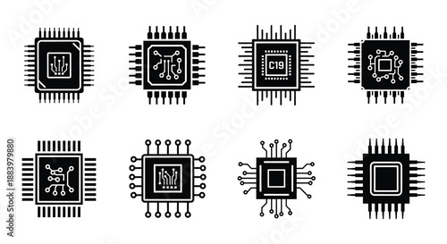 A collection of black and white electronic microchips displayed in various orientations