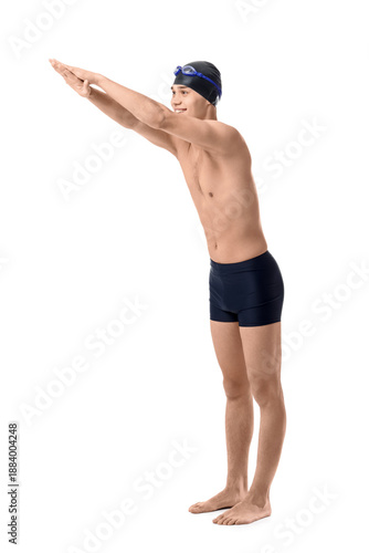 Young male swimmer on white...