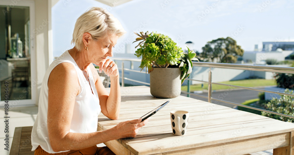 Fototapeta premium Balcony, coffee and thinking with mature woman at apartment for break, decision or social media. Home, reading or relax and female person with beverage outdoor for fresh air, me time or planning
