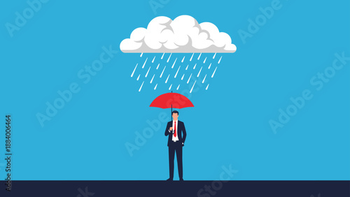 Businessman standing alone under a small raining cloud while holding a red umbrella for protection against the rain shower.
