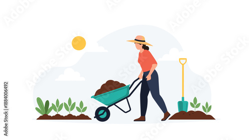 Young woman wearing a sun hat and pushing a wheelbarrow full of soil through a garden patch with young green plants.