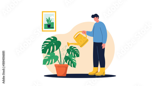 Man in blue shirt and yellow boots watering a large potted Monstera plant with a yellow watering can indoors.