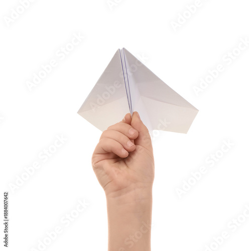Child's hand with paper pla...