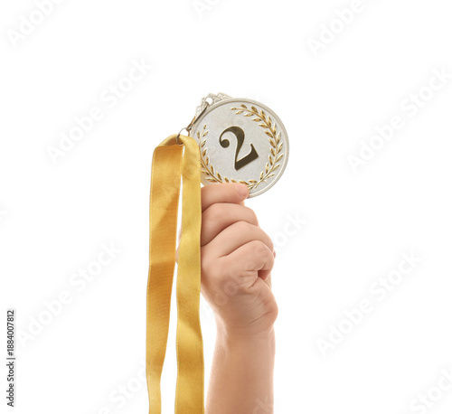 Child's hand with second pl...