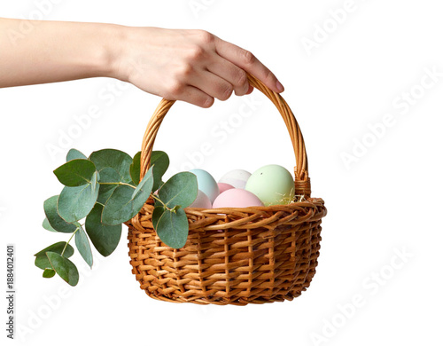 Wallpaper Mural Hand Carrying Wicker Basket with Pastel Easter Eggs and Eucalyptus graphic design Torontodigital.ca