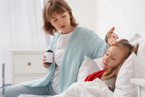 Mother with cough syrup che...