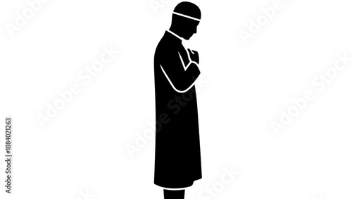 Silhouette of a person in contemplation and prayer.