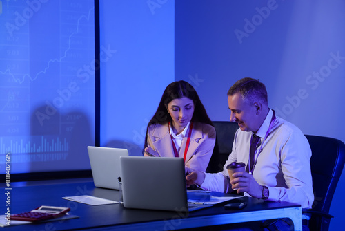 Business analysts working a...