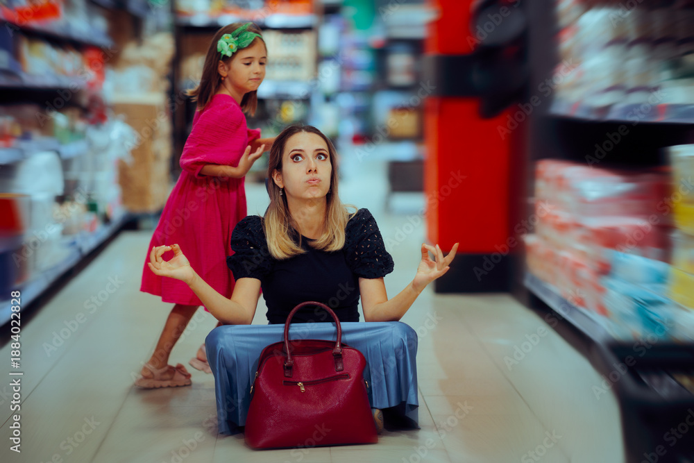 Obraz premium Mom Stressed Out by Her Hyperactive Daughter in the Supermarket. Tired mother trying to handle her high-energy child in the store