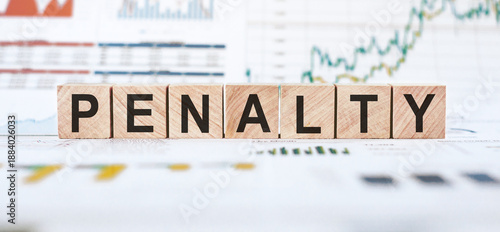 Wooden Blocks Spelling Out Penalty on a Business Office Desk