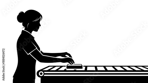 Woman working with a large roll of material.