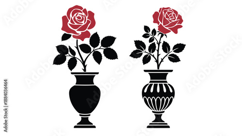 Two red roses in black and white vases on a plain background
