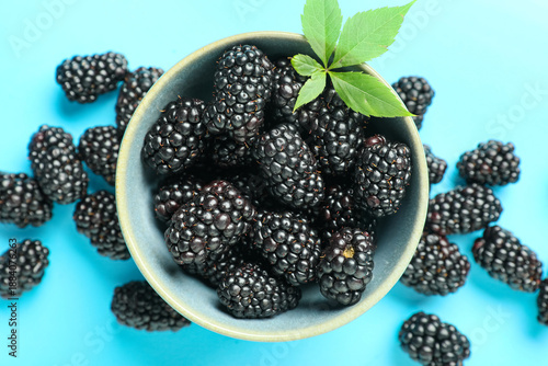 Bowl with ripe blackberry o...