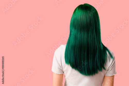 Young woman with green hair...