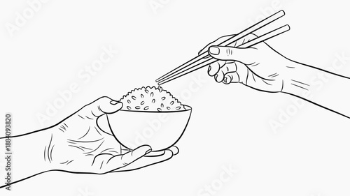 Hand holding a bowl of rice with chopsticks for cultural food sharing concept