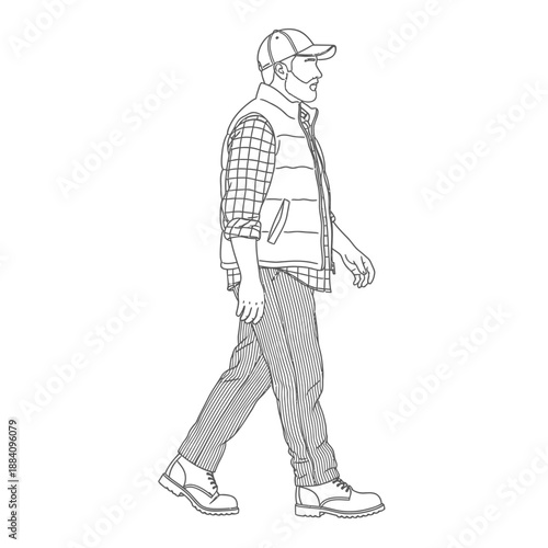 Man in casual outdoor clothing walking confidently.