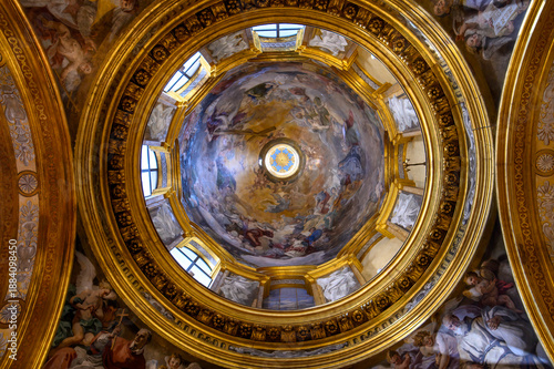 Naples, Italy. Girolamini Church (Chiesa dei Girolamini), featuring a spectacular golden coffered ceiling and marble columns.