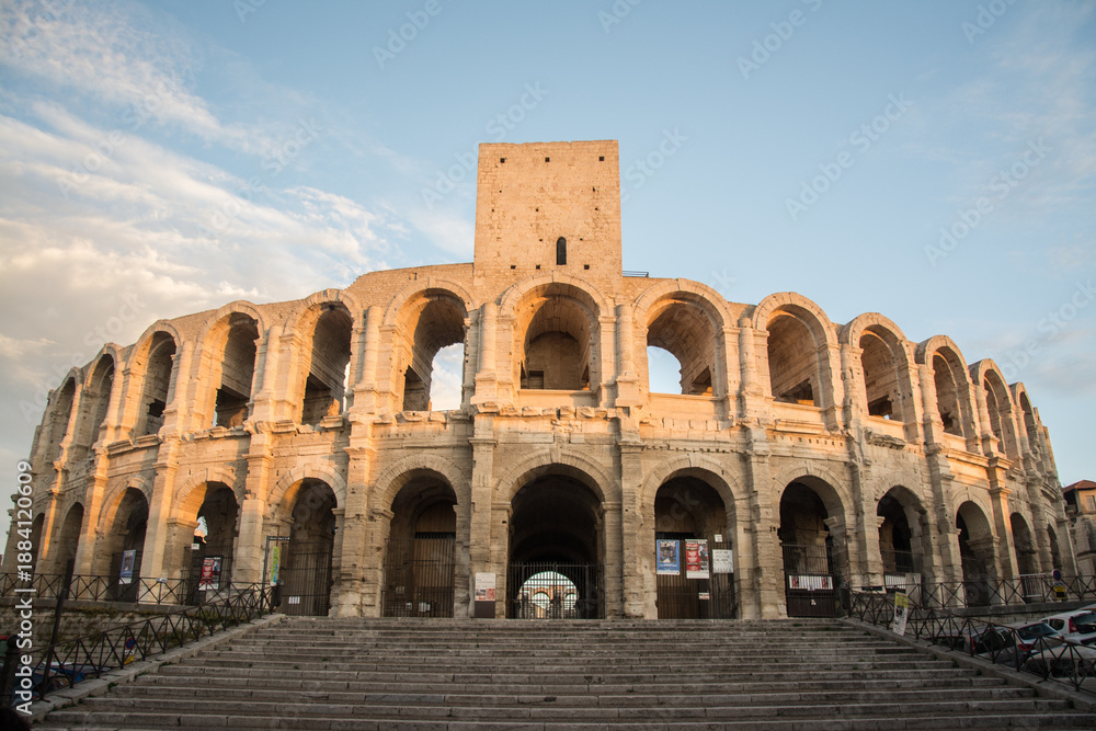 Fototapeta premium The Arena of Verona, an ancient Roman amphitheater, bathed in warm evening light during sunset. Italy. 