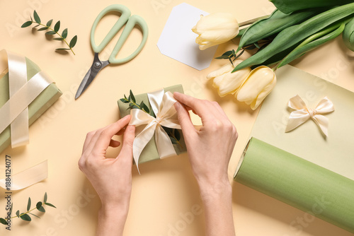 Female hands with gift boxe...