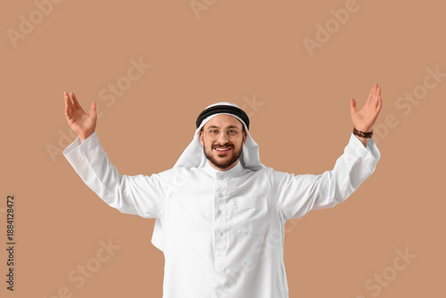Happy Arab businessman on b...