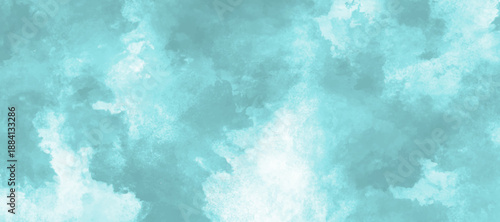 serene and dreamy sky with soft, white clouds scattered across a light blue background.