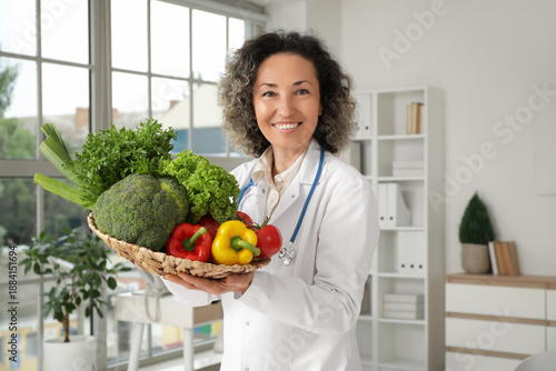 Mature female nutritionist ...