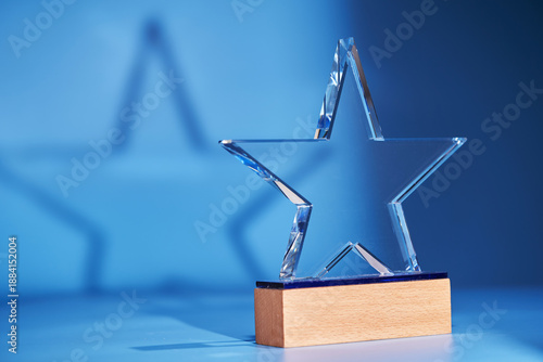 star shape trophy against blue background