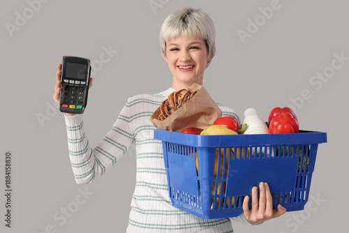 Young woman with full shopp...