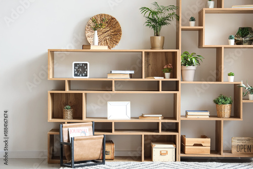 Wooden bookshelf with artif...