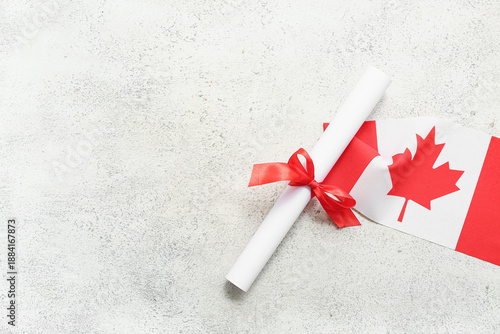 Diploma with red ribbon and...