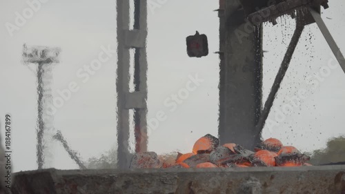 Molten pig iron ingots dropping during production process