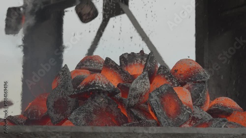 Hot pig iron ingots piled in casting machine