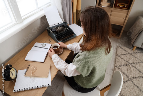 Female author with coffee c...