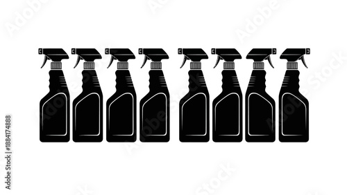 A row of black spray bottles for cleaning products on a white background.