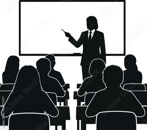 Silhouette of teacher pointing at whiteboard in classroom with students