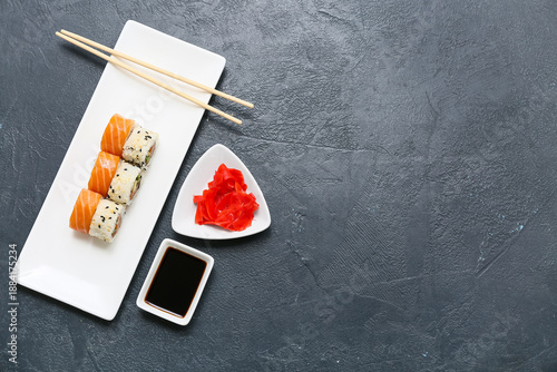 Tasty sushi rolls with soy ...