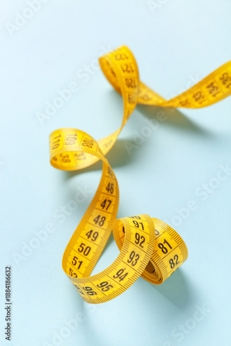 Yellow measuring tape on bl...