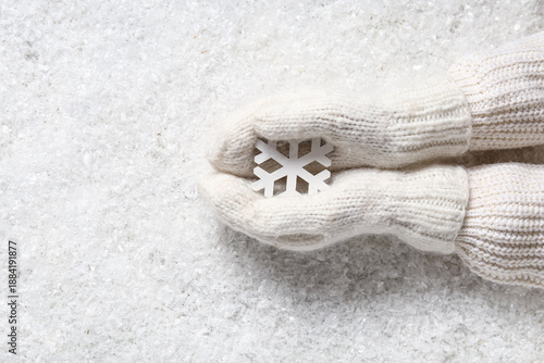 Female hands in warm mitten...