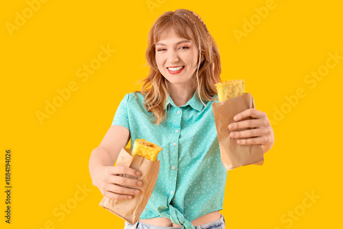 Young woman with tasty sand...