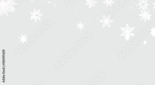 White snowflakes scattered across light gray background in festive winter-themed arrangement, evoking seasonal atmosphere and decorative charm for holiday design, greeting cards, and cozy visual compo