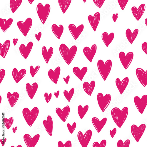 Pink hand-drawn hearts forming a seamless pattern on a white background. Pink heart pattern creating simple love background