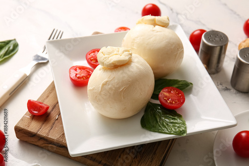 Plate of tasty Burrata chee...