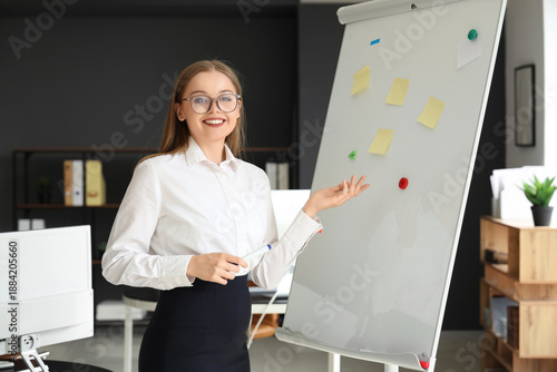 Young businesswoman giving ...