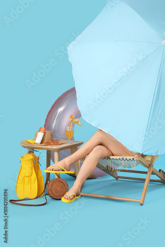 Young woman sitting in deck...