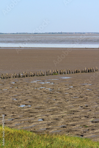 View across the National park of Vadehavet to Romo island at low tide from the causeway. Wadden Sea National Park, Southern Jutland, Denmark in the summer.