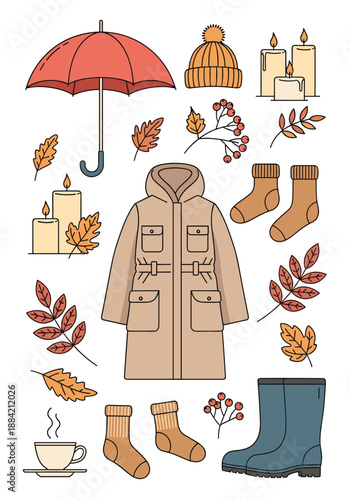 Cozy autumn season collection with a tan parka coat blue rain boots umbrella warm socks leaves and lighted candles.