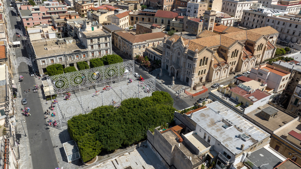 Fototapeta premium Aerial view of Reggio Calabria Cathedral, in Italy. It is a Roman Catholic cathedral in the historic center of the city. Its dedication is to the Assumption of the Virgin Mary. It is a sunny morning.