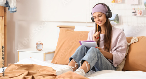 Teenage girl with headphone...