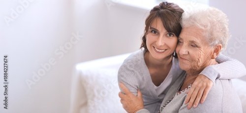 Happy elderly woman with he...